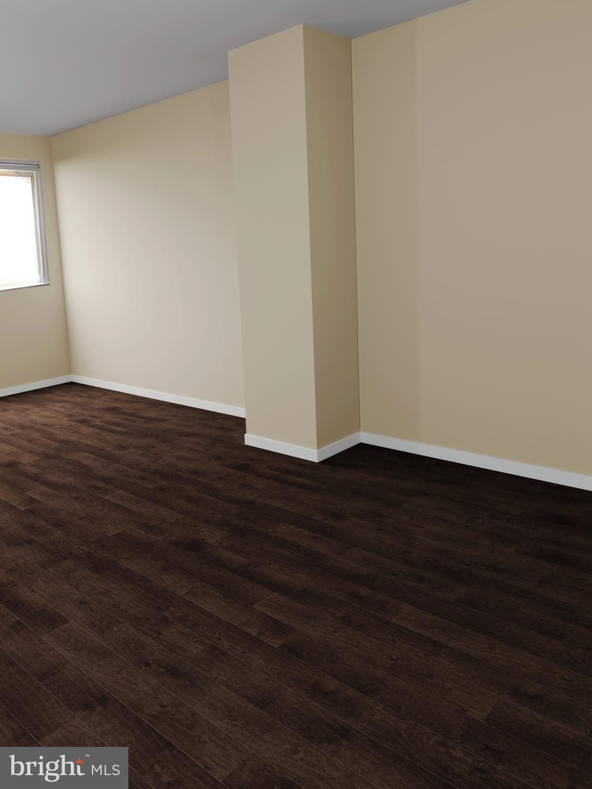 1623 Worrell Street Philadelphia, PA 19124 - Photo 9 of 17 a view of an empty room with wooden floor