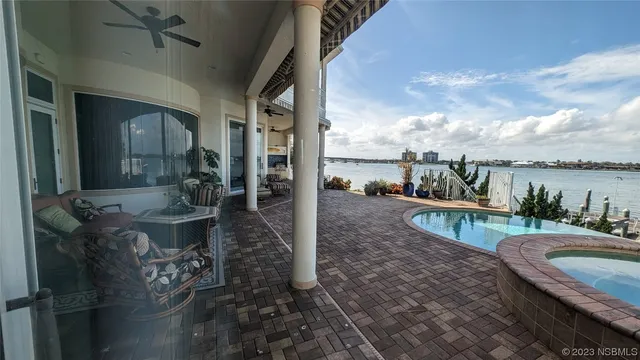 a view of two chairs in patio