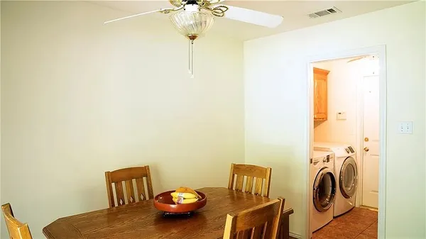 a view of a bedroom with a baby crib