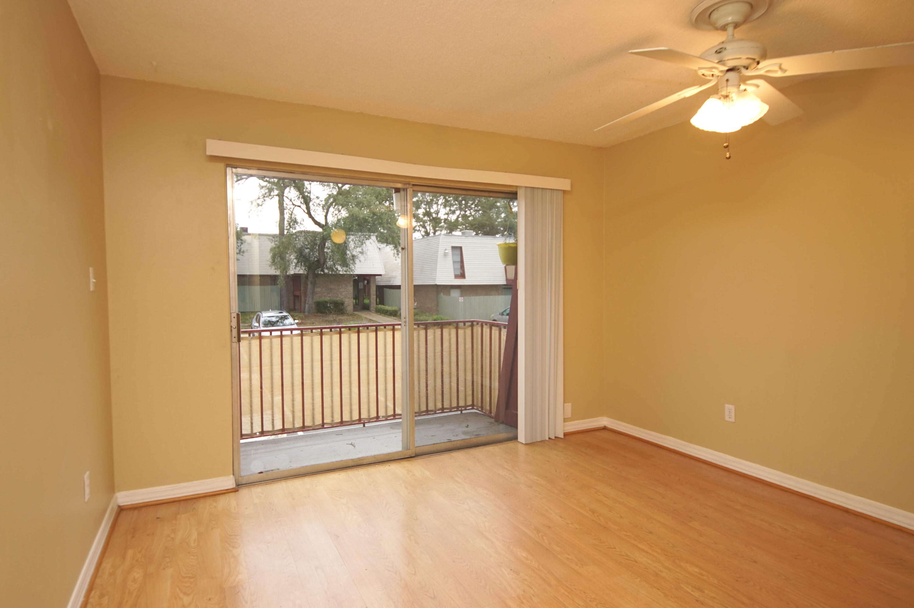 210 Pelham Road, Unit 219C Fort Walton Beach, FL 32547 - Photo 3 of 23 an empty room with a window
