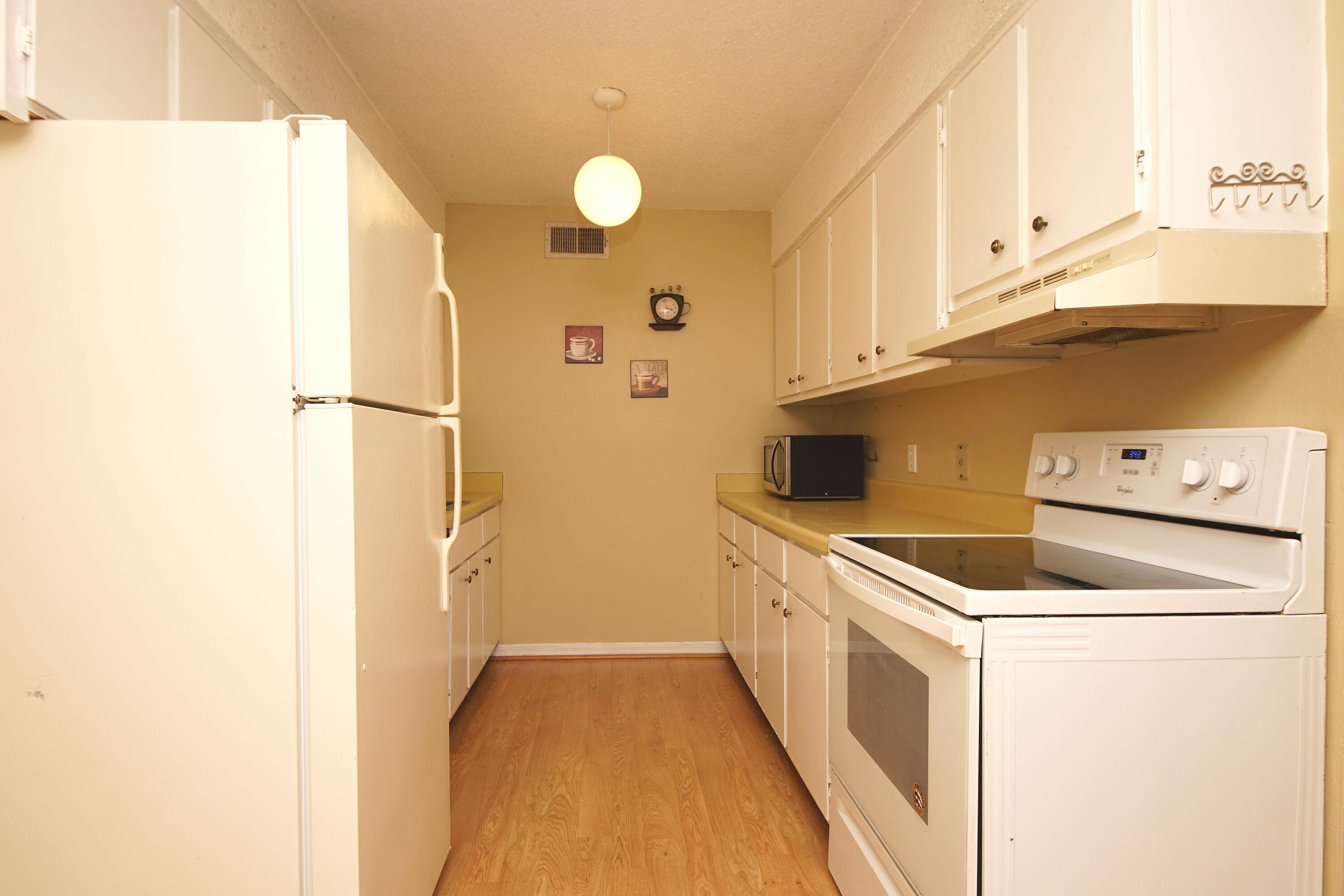 210 Pelham Road, Unit 219C Fort Walton Beach, FL 32547 - Photo 9 of 23 a utility room with dryer and washer