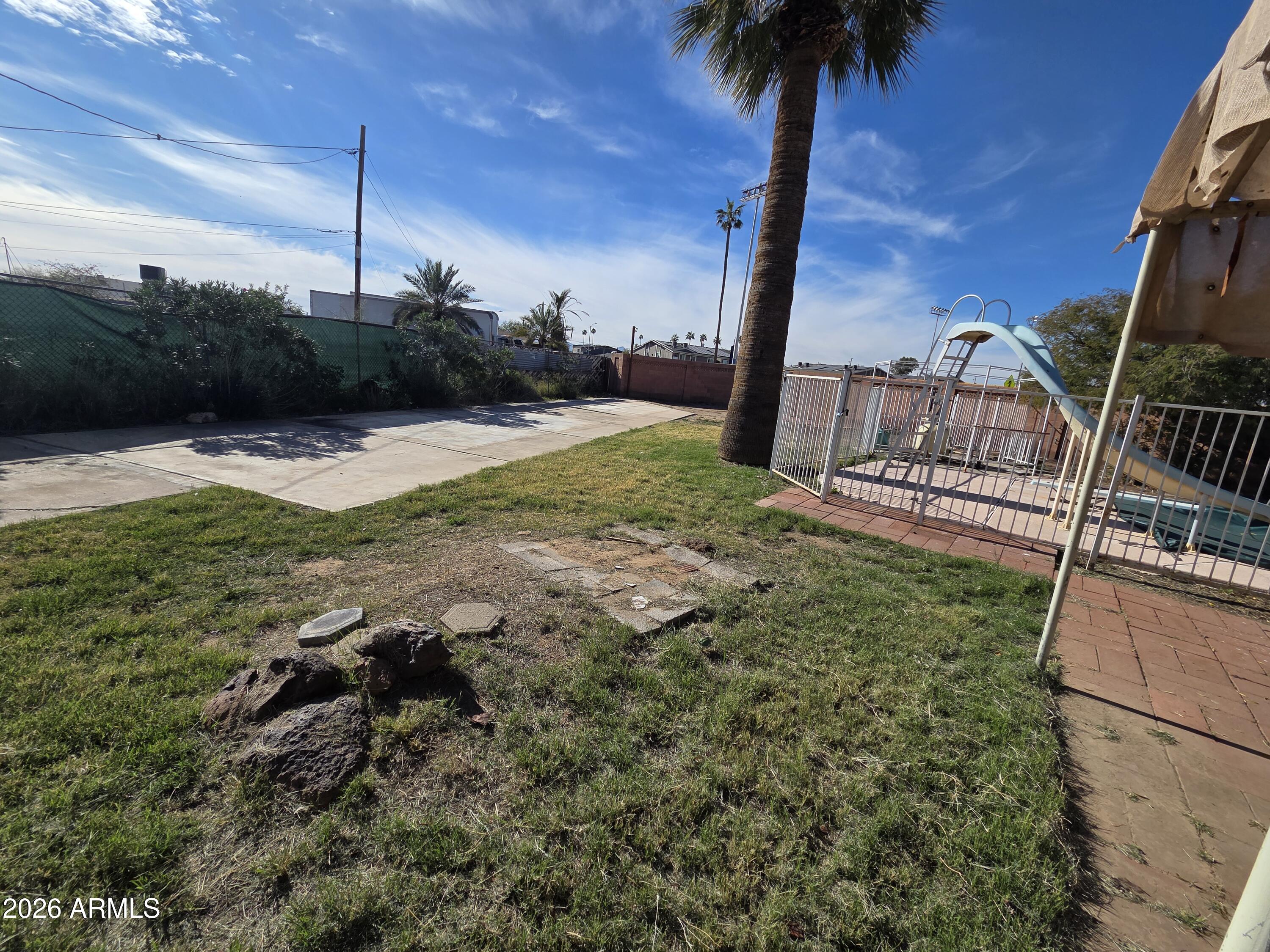 3237 West Pierce Street Phoenix, AZ 85009 - Photo 12 of 20 a view of a yard with an outdoor space