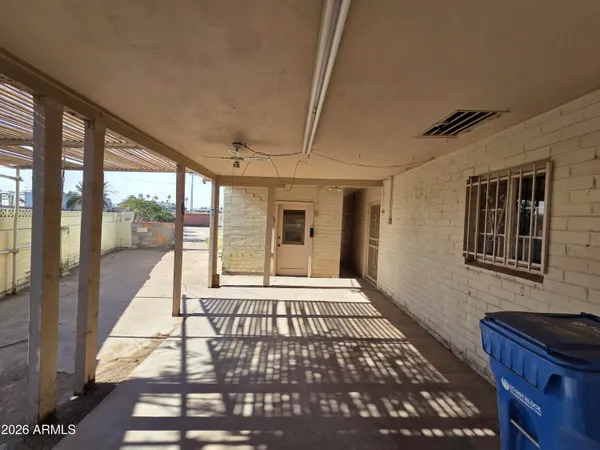 a view of a room with racks on the wall