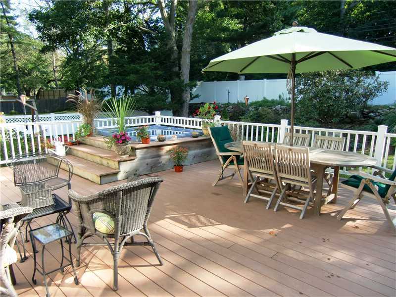 43 Long Meadow Road Riverside, CT 06878 - Photo 9 of 13 a balcony with table and chairs