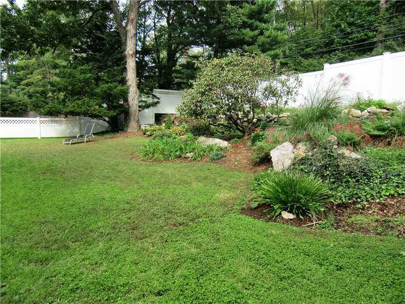 43 Long Meadow Road Riverside, CT 06878 - Photo 10 of 13 a view of a garden with a fountain