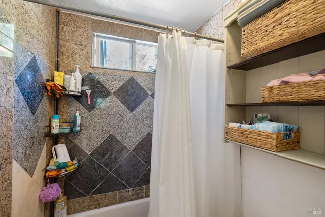 a bathroom with a sink double vanity and a mirror