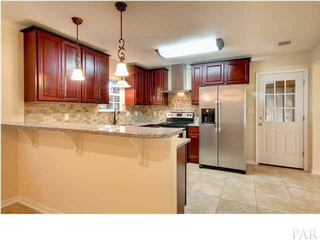 7530 Templeton Road Pensacola, FL 32506 - Photo 8 of 24 Kitchen to garage door.