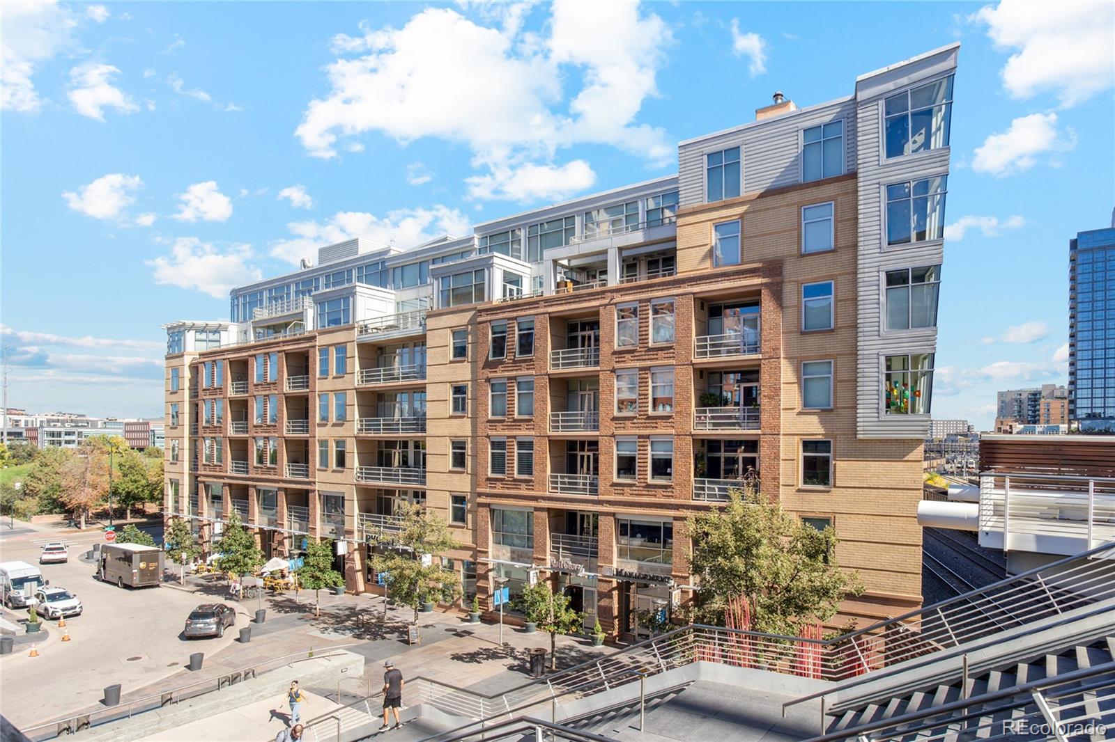 1610 Little Raven Street, Unit 511 Denver, CO 80202 - Photo 29 of 34 a front view of a building with street view