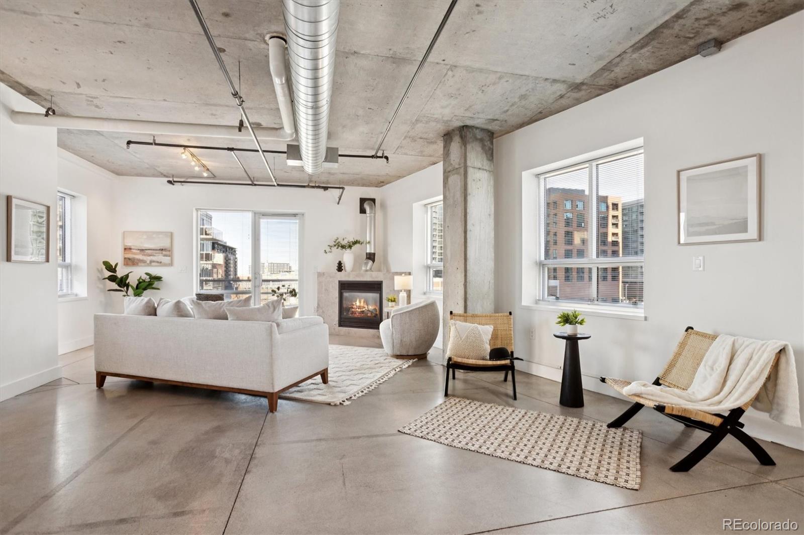 1610 Little Raven Street, Unit 511 Denver, CO 80202 - Photo 8 of 34 a living room with furniture