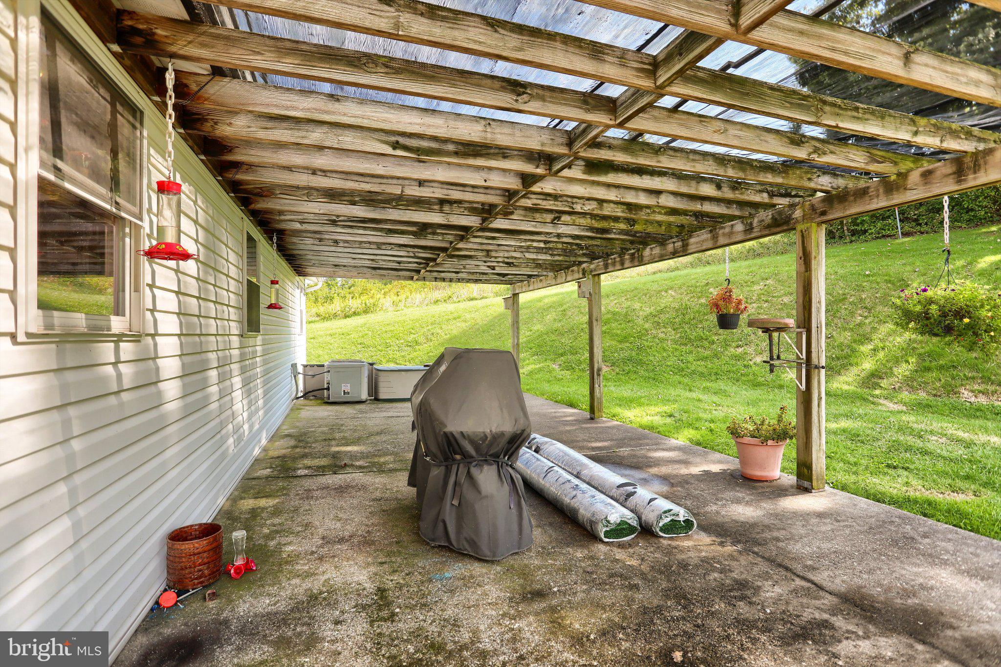 7620 Spring Road New Bloomfield, PA 17068 - Photo 36 of 49 REAR PORCH