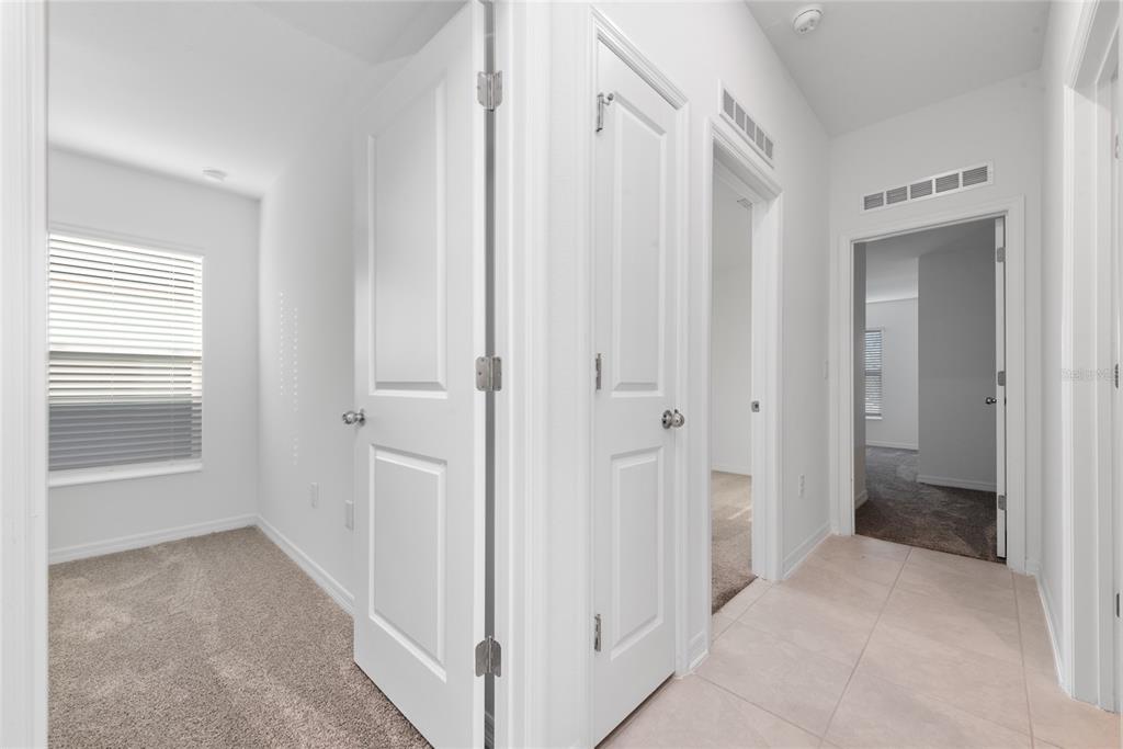 338 Rustic Rail Dr Lake Lake Wales, FL 33859 - Photo 14 of 22 a view of a hallway with closet area