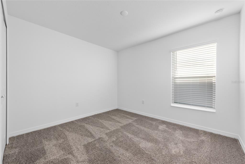338 Rustic Rail Dr Lake Lake Wales, FL 33859 - Photo 15 of 22 an empty room with a window