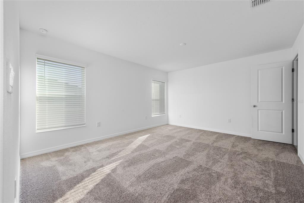 338 Rustic Rail Dr Lake Lake Wales, FL 33859 - Photo 8 of 22 a view of an empty room with a window