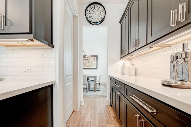 a view of a hallway with washer and dryer
