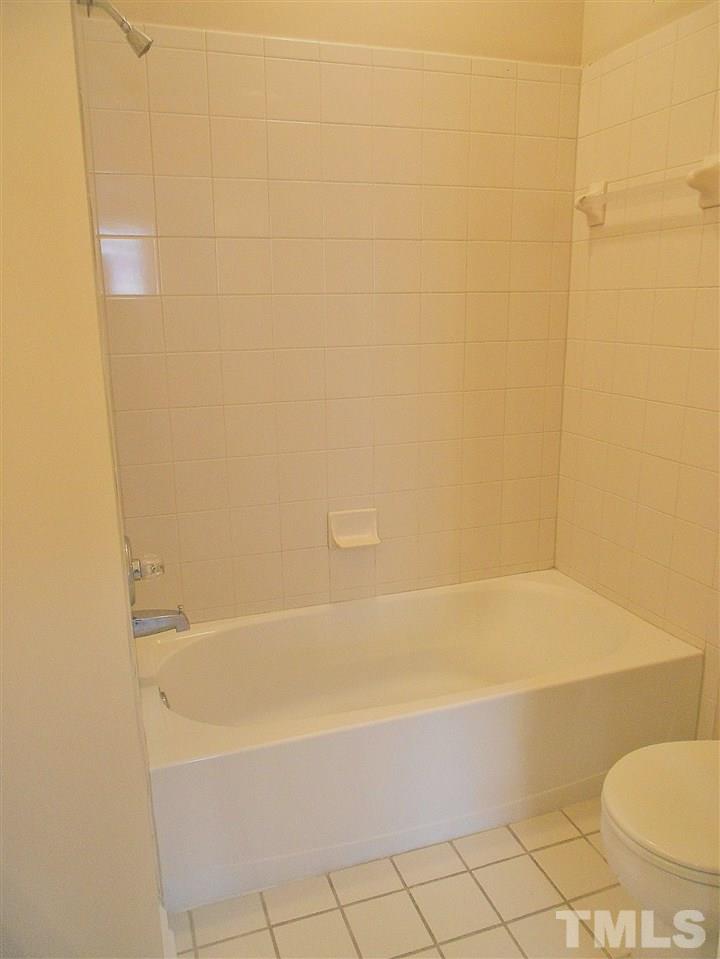 8231 Allyns Landing Way, Unit 304 Raleigh, NC 27615 - Photo 13 of 25 ...has ceramic tile floor and tub surround.