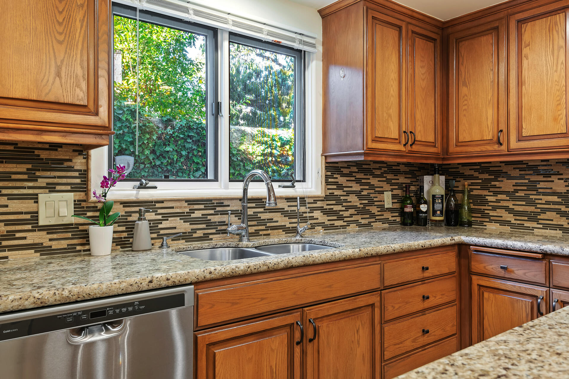 Undisclosed Address Santa Barbara, CA 93101 - Photo 16 of 25 a kitchen with granite countertop a sink and a window