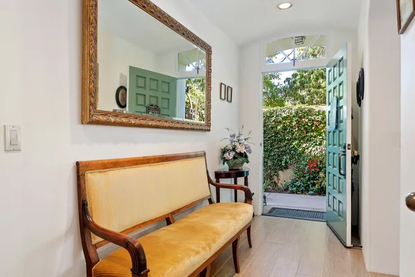 hallway with table and chairs