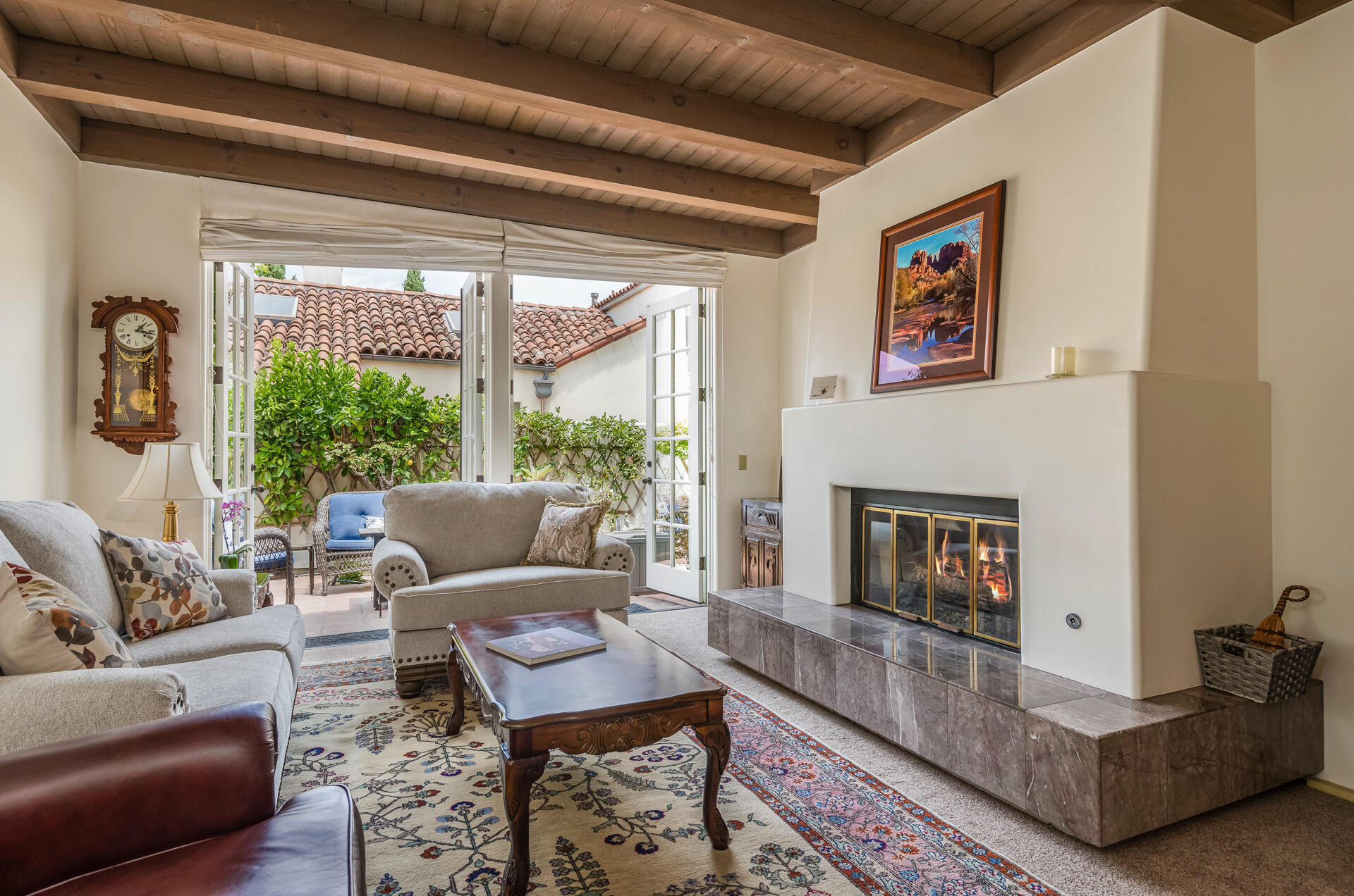 Undisclosed Address Santa Barbara, CA 93101 - Photo 7 of 25 a living room with furniture and a fireplace