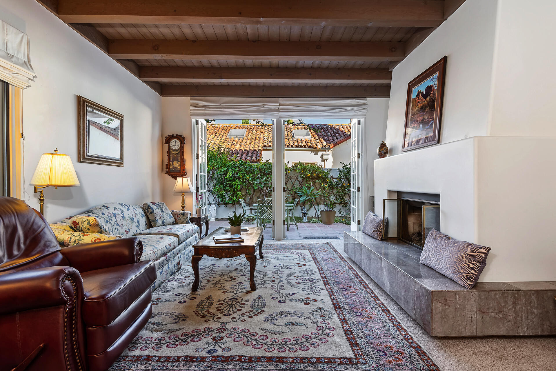 Undisclosed Address Santa Barbara, CA 93101 - Photo 8 of 25 a living room with furniture and a fireplace