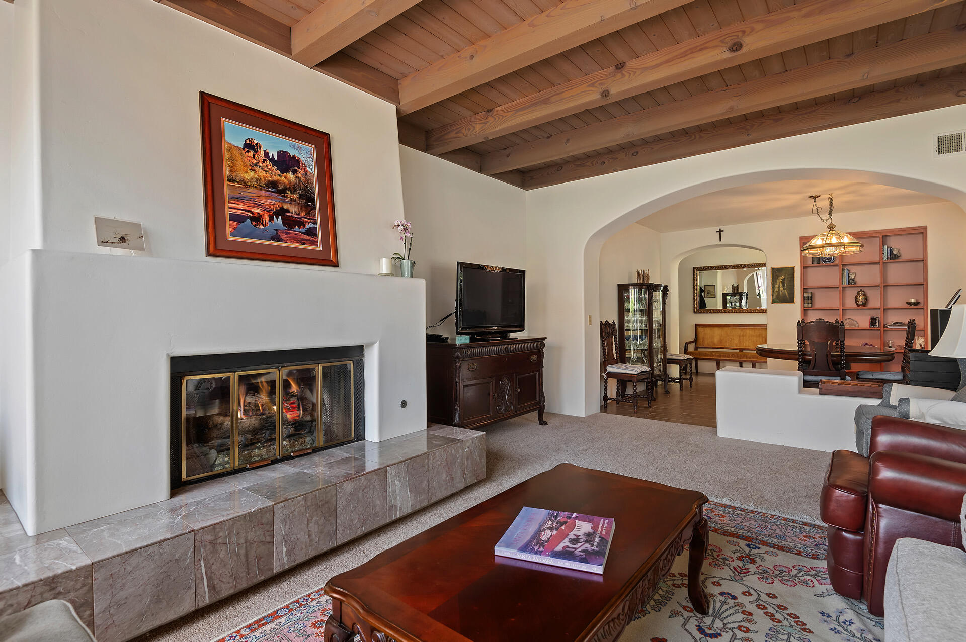 Undisclosed Address Santa Barbara, CA 93101 - Photo 9 of 25 a living room with furniture and a flat screen tv