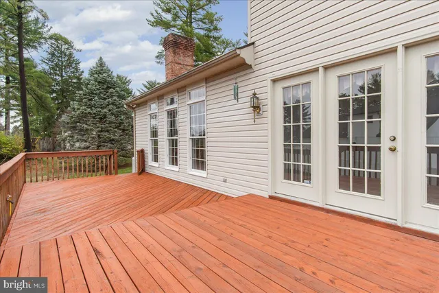a view of a backyard with sitting area