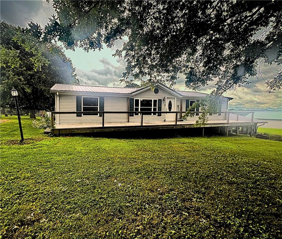 1155 Union Flat Road Shelocta, PA 15774 - Photo 1 of 38 a front view of a house with a garden and trees