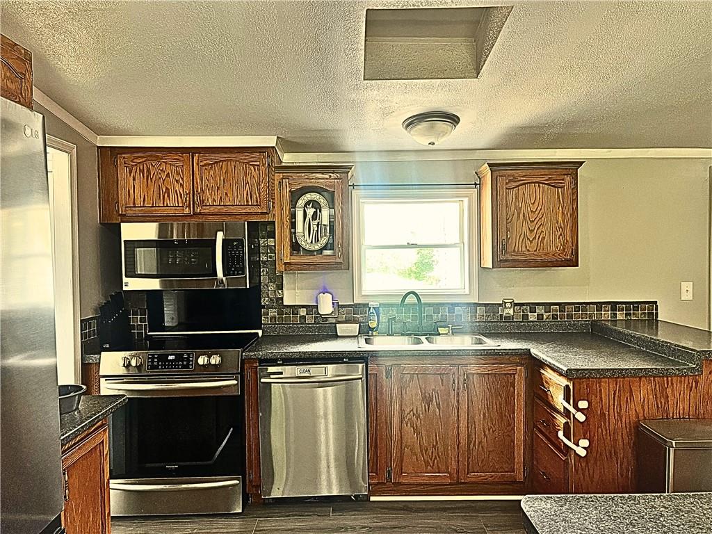 1155 Union Flat Road Shelocta, PA 15774 - Photo 6 of 38 a kitchen with a stove and a microwave