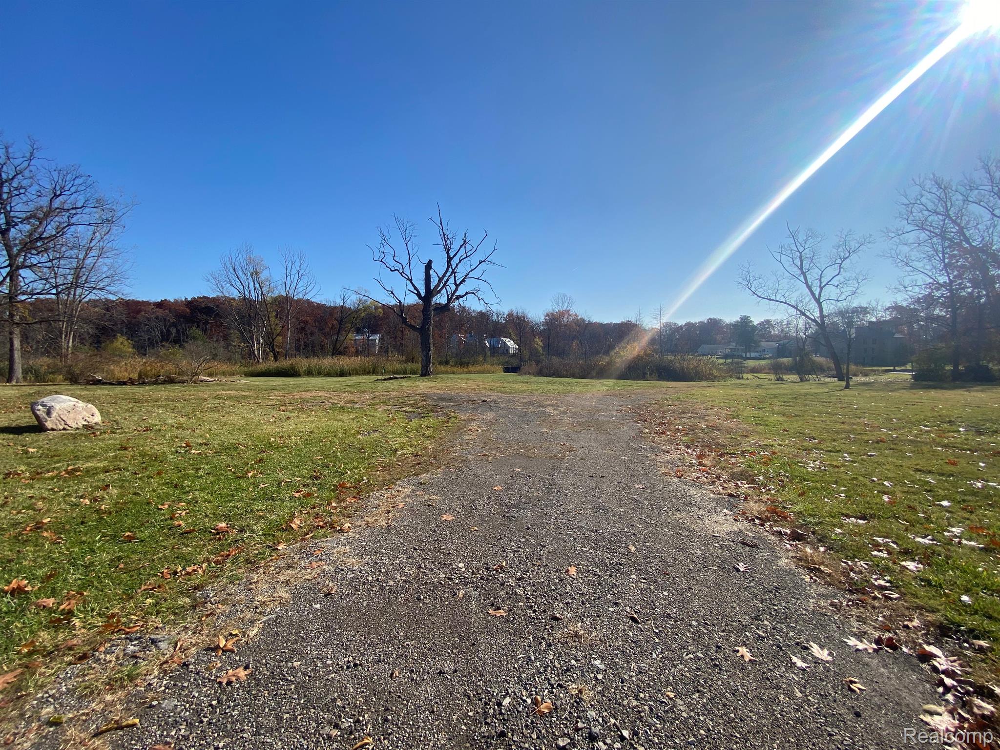 22883 Meridian Road Grosse Ile, MI 48138 - Photo 1 of 13 The Drive in from Meridian Rd