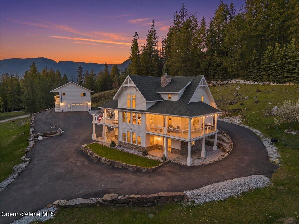 357 East David Thompson Road Hope, ID 83836 - Photo 3 of 47 116-Twilight Aerial Back of Home