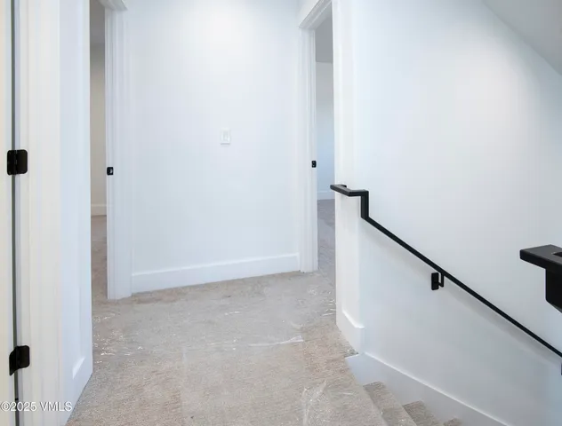 a view of hallway with stairs