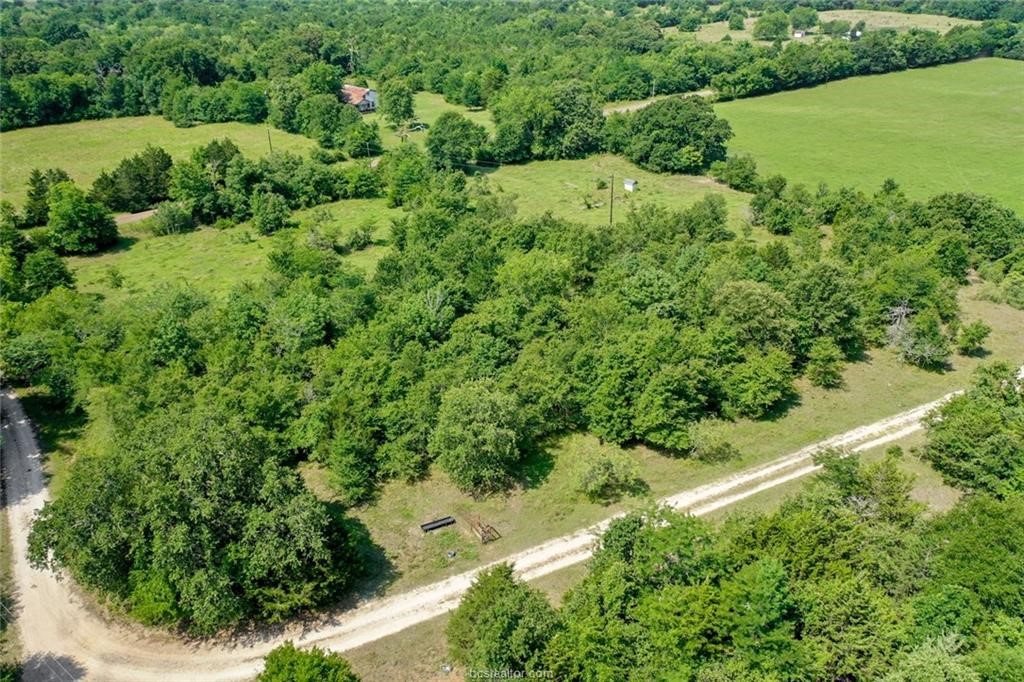 37.5-ac Antioch Road Midway, TX 75852 - Photo 3 of 24 an aerial view of a house with a yard