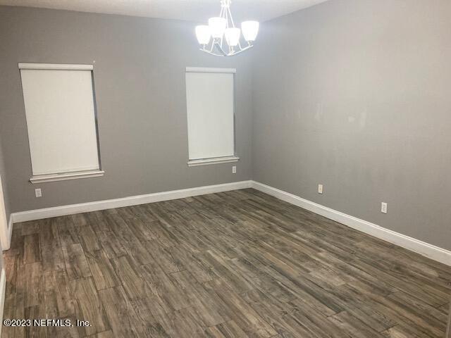 321 Stonehurst Parkway St. Augustine, FL 32092 - Photo 16 of 39 wooden floor in an empty room with a window