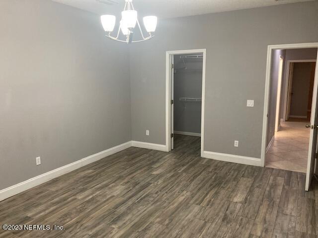 321 Stonehurst Parkway St. Augustine, FL 32092 - Photo 18 of 39 a view of empty room with wooden floor