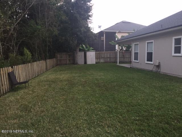 321 Stonehurst Parkway St. Augustine, FL 32092 - Photo 30 of 39 a view of a backyard