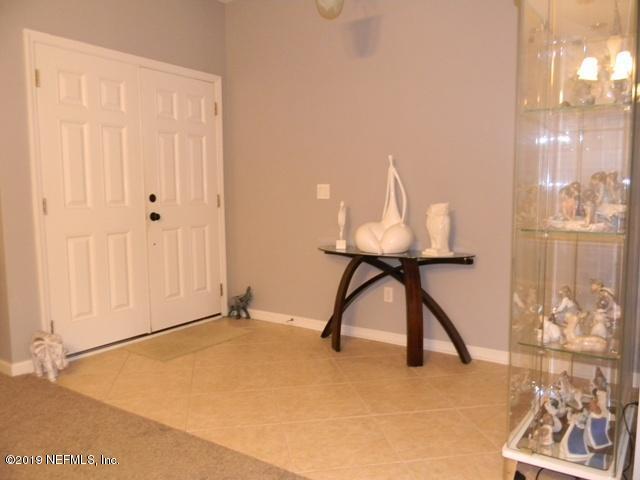 321 Stonehurst Parkway St. Augustine, FL 32092 - Photo 3 of 39 a view of a livingroom with furniture and a window