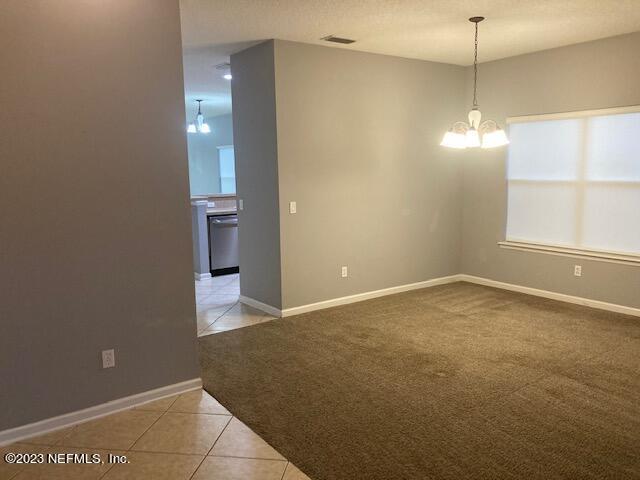 321 Stonehurst Parkway St. Augustine, FL 32092 - Photo 4 of 39 a view of an empty room with a window