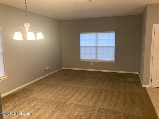 321 Stonehurst Parkway St. Augustine, FL 32092 - Photo 5 of 39 an empty room with a window
