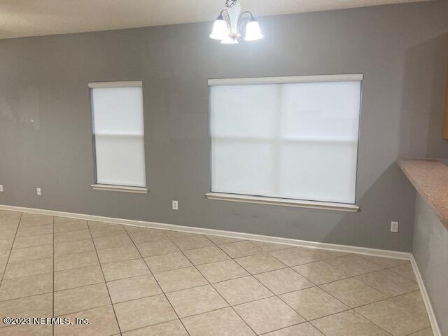 321 Stonehurst Parkway St. Augustine, FL 32092 - Photo 10 of 39 a view of an empty room with a window