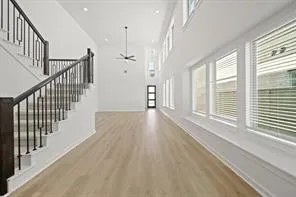 a view of an entryway with wooden floor
