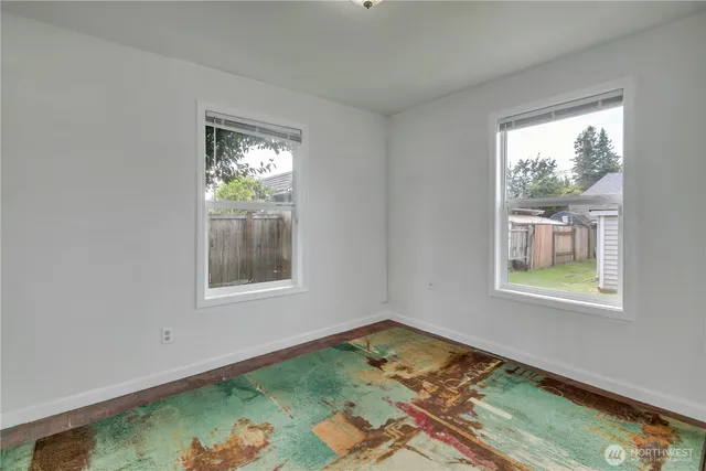 a view of an empty room and window