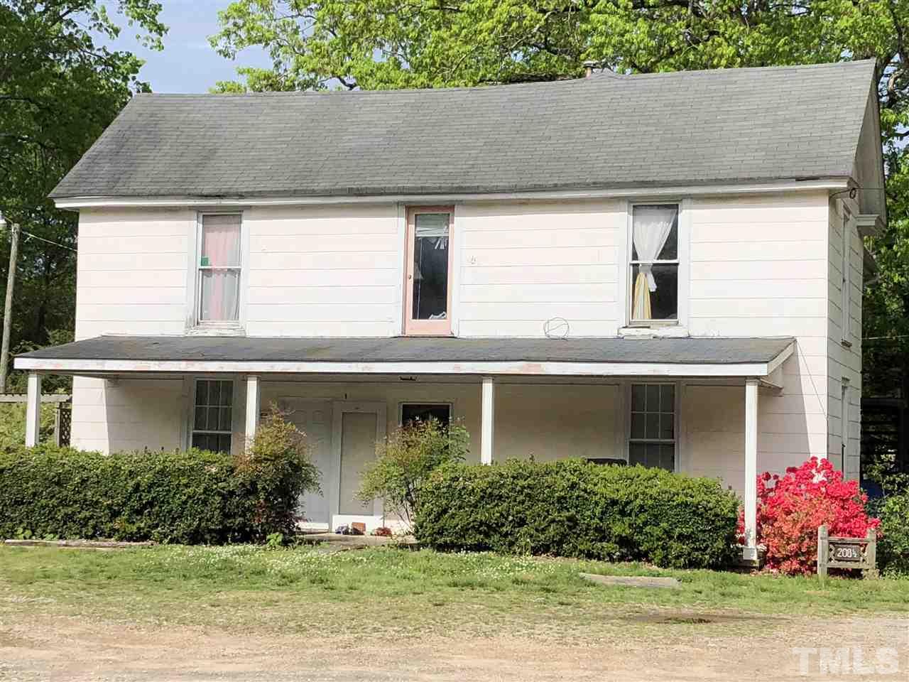 208 Jones Franklin Road Raleigh, NC 27606 - Photo 3 of 5 front view of a house with a yard