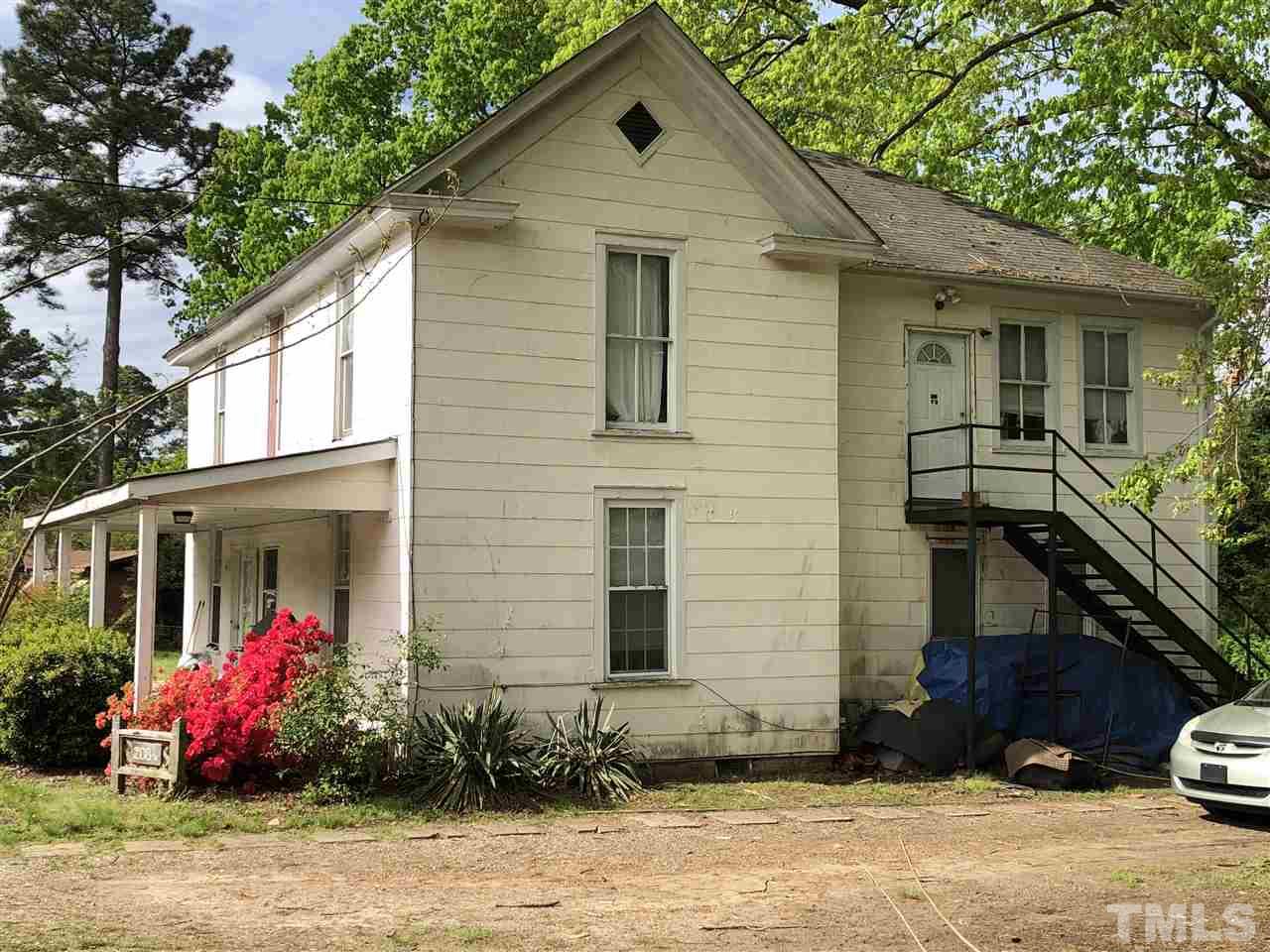 208 Jones Franklin Road Raleigh, NC 27606 - Photo 5 of 5 a front view of a house with a yard
