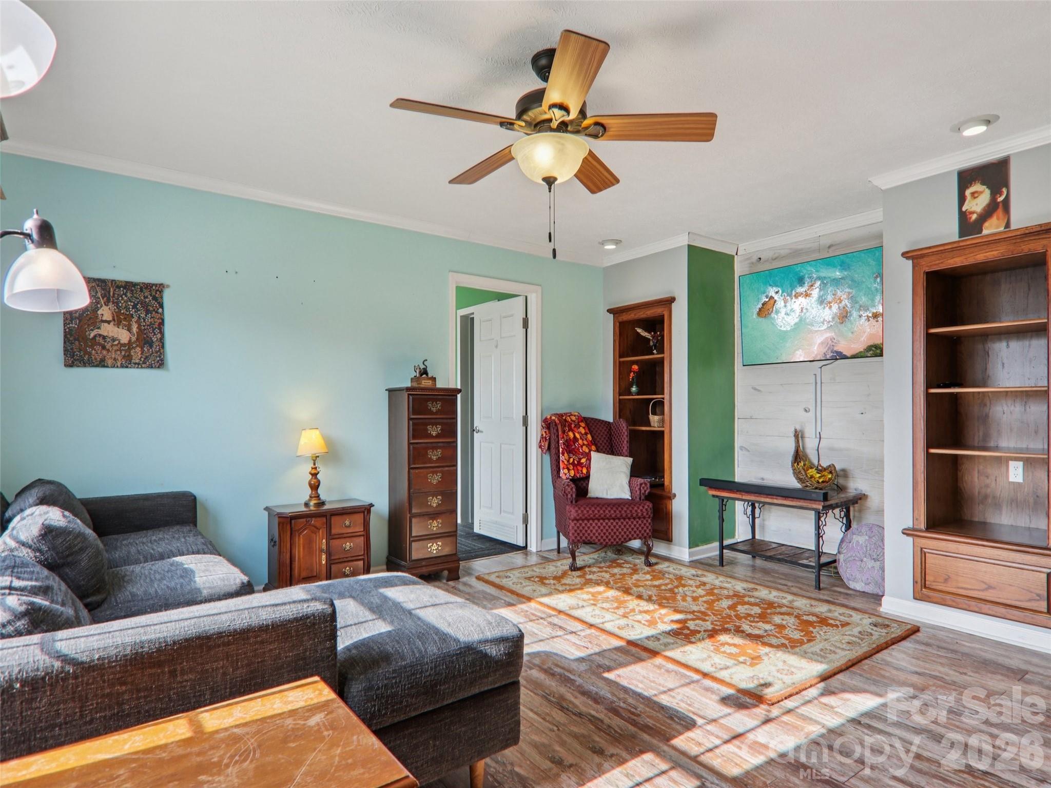 3195 North Clear Creek Road Hendersonville, NC 28792 - Photo 2 of 21 a living room with furniture and a rug