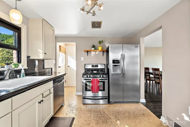 a bedroom with furniture and a book shelf