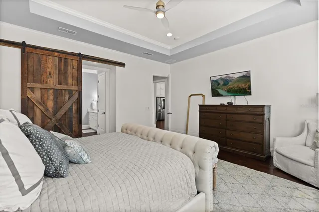 a bedroom with a bed and furniture