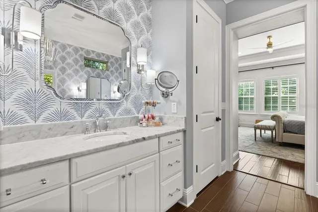 a bathroom with a tub and shower