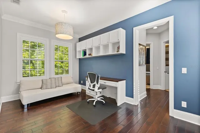a view of workspace with wooden floor