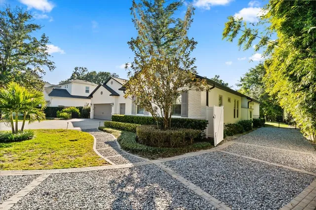 a living room with furniture and windows