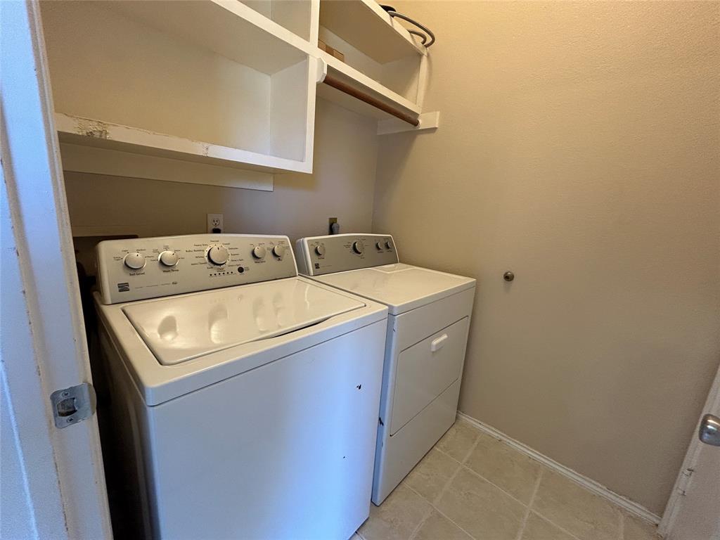 3805 Pine Valley Drive Plano, TX 75025 - Photo 15 of 16 a utility room with dryer and washer