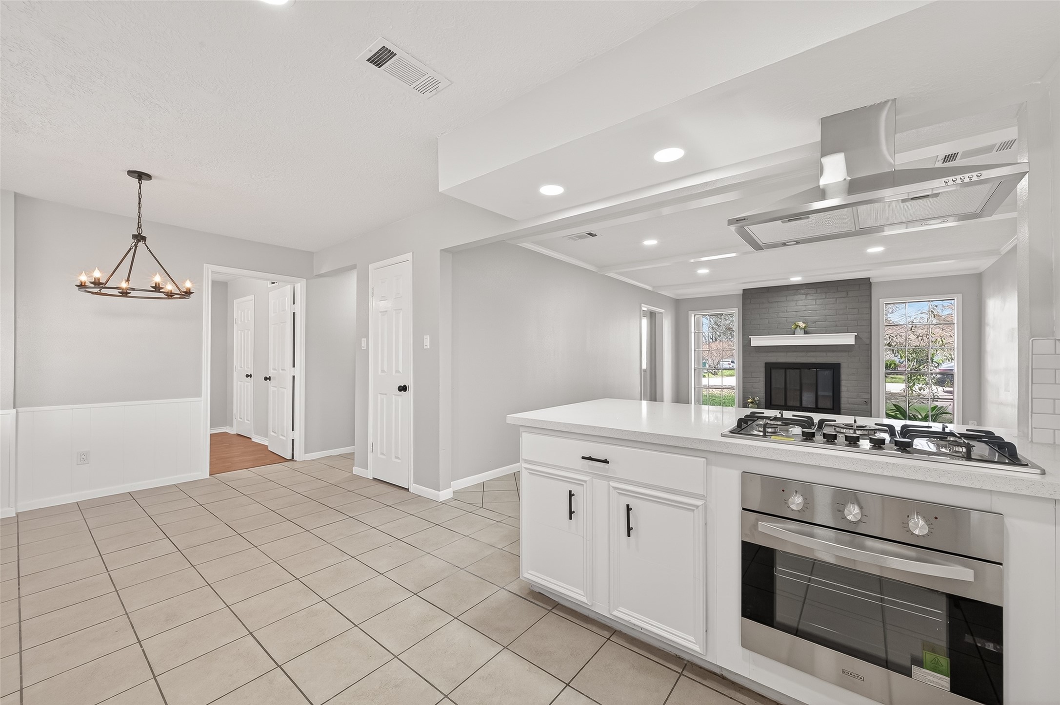 21710 Rotherham Drive Spring, TX 77388 - Photo 16 of 49 a kitchen with a stove and a sink